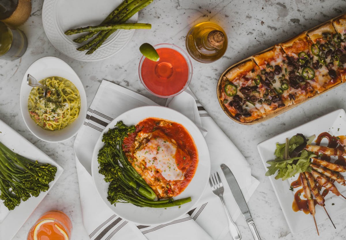 a bunch of different types of food on a table