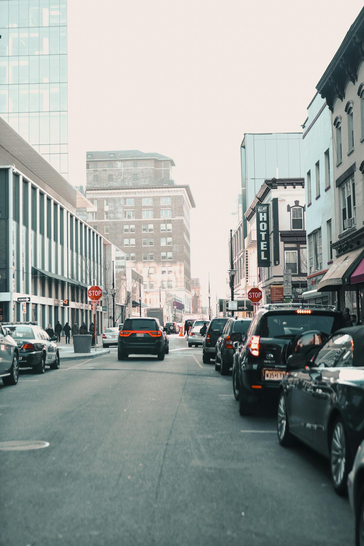 a car driving on a city street filled with lots of traffic