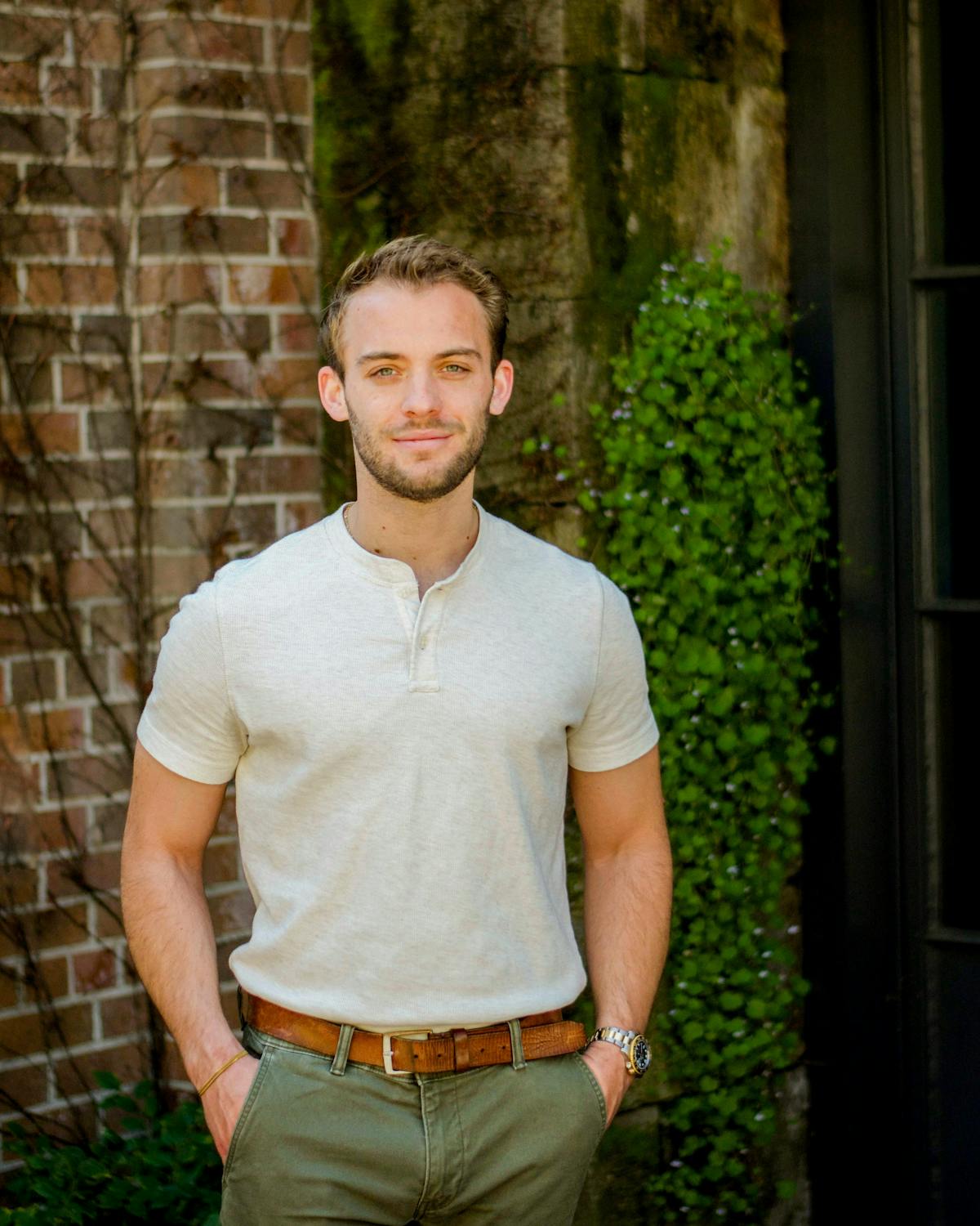 a man standing in front of a building