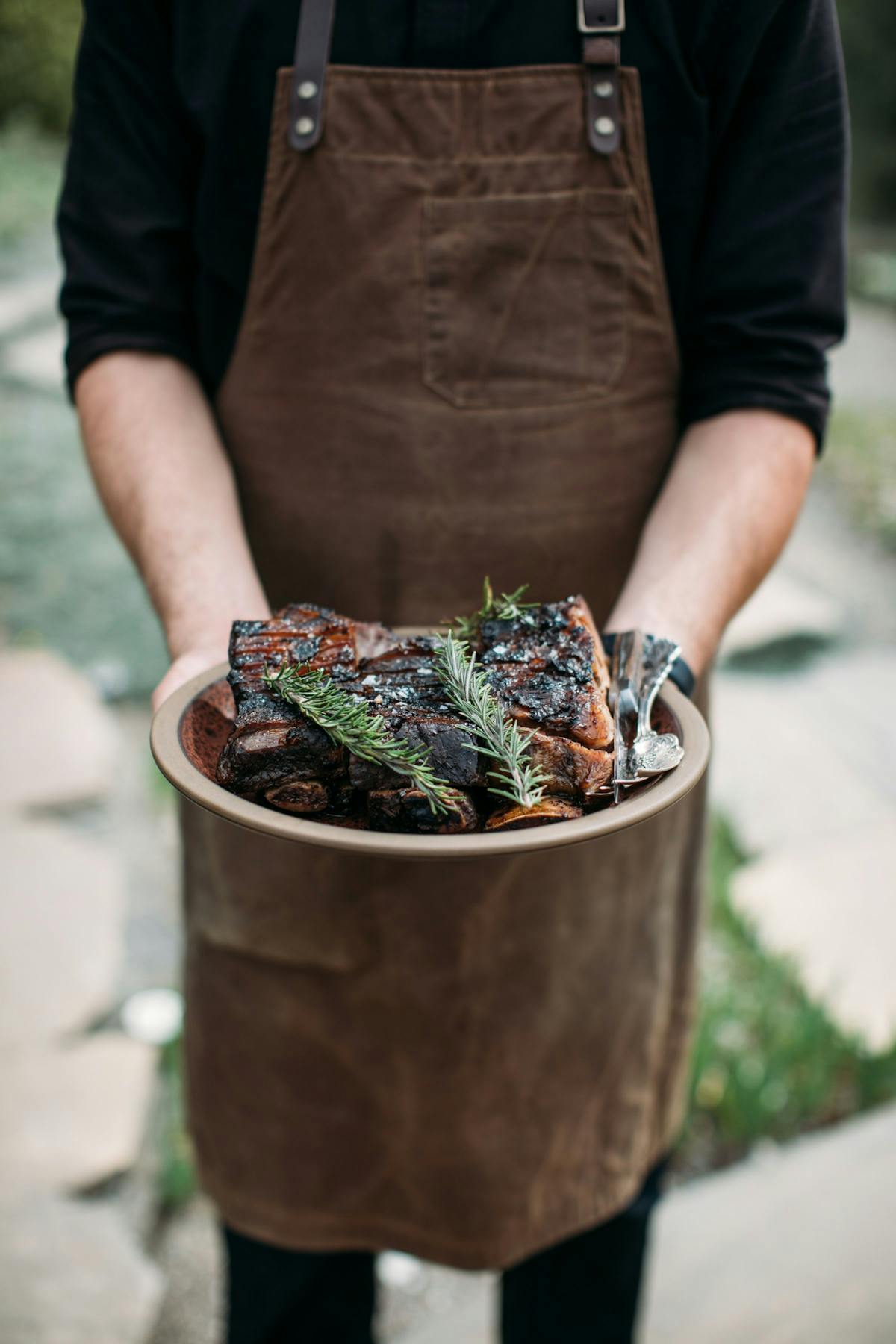 a man standing in front of a bowl