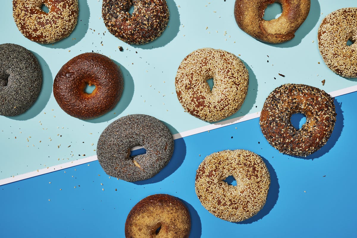 a group of assorted doughnuts on a table