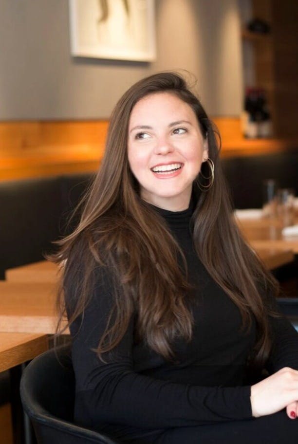 a woman smiling for the camera
