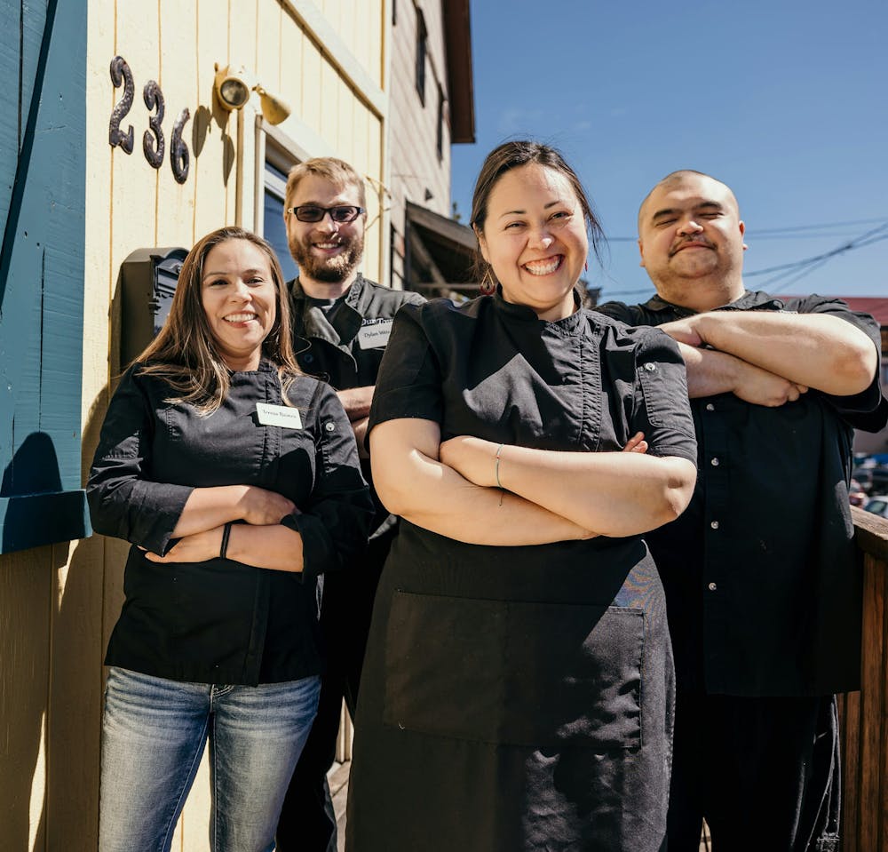 a group of people posing for the camera