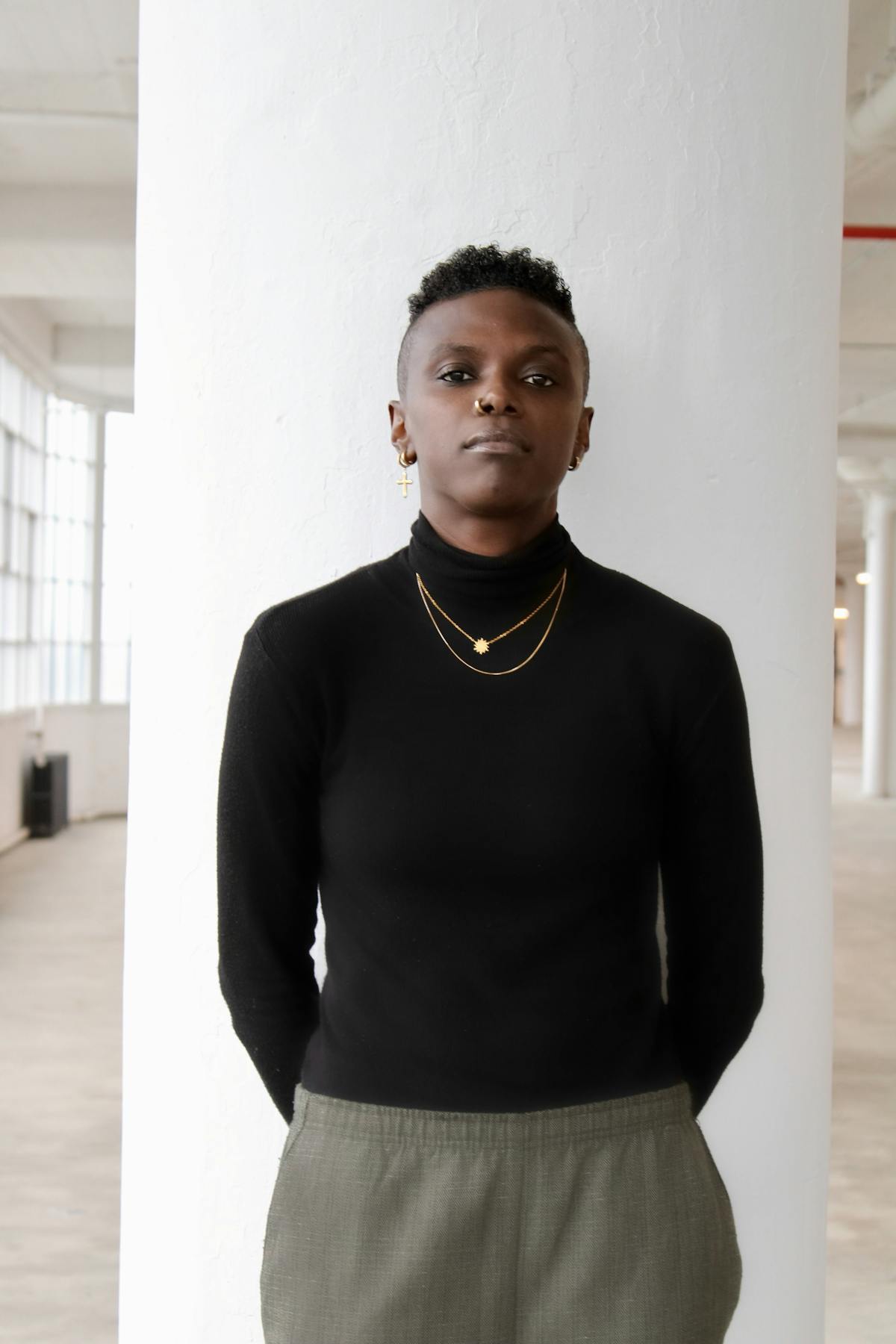 a person standing posing for the camera