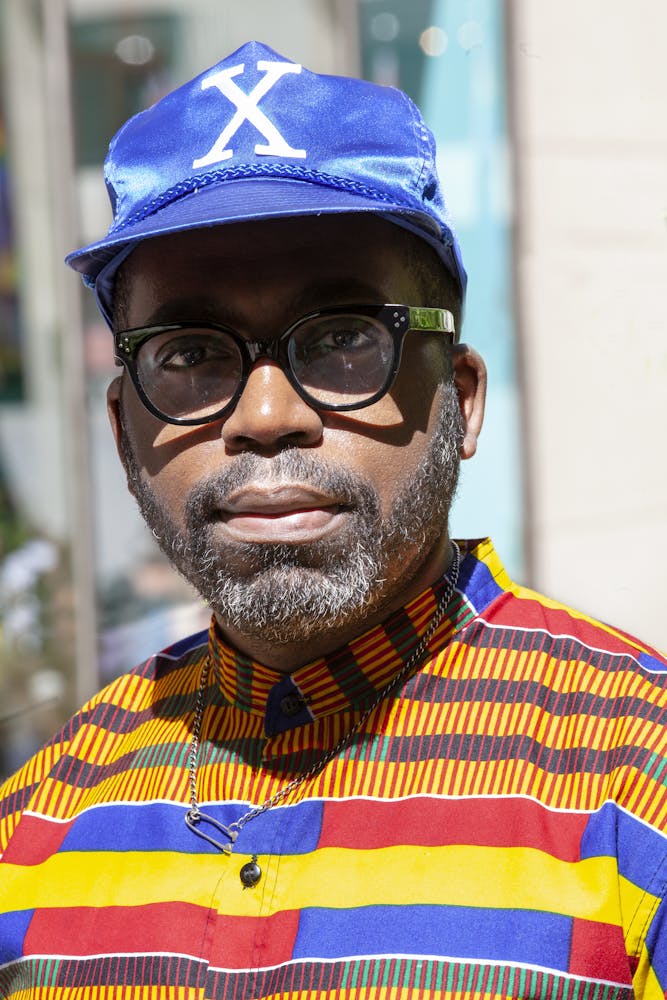 a man wearing sunglasses and a hat