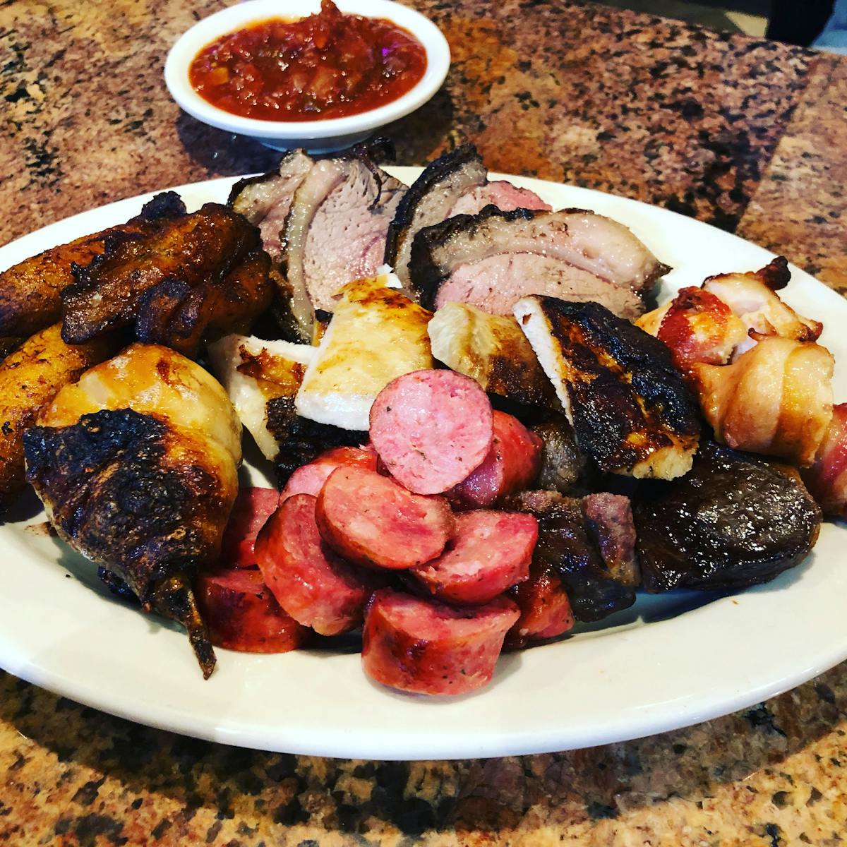 a white plate topped with different types of food