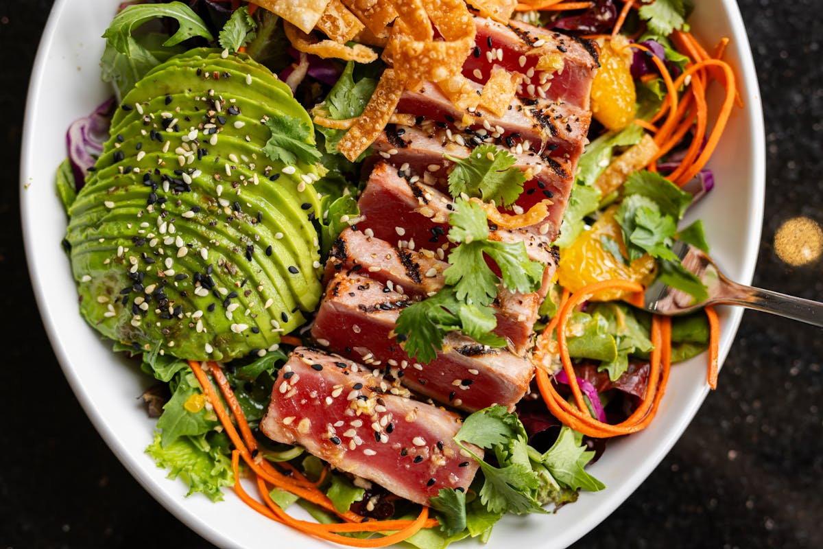 a bowl of salad on a plate