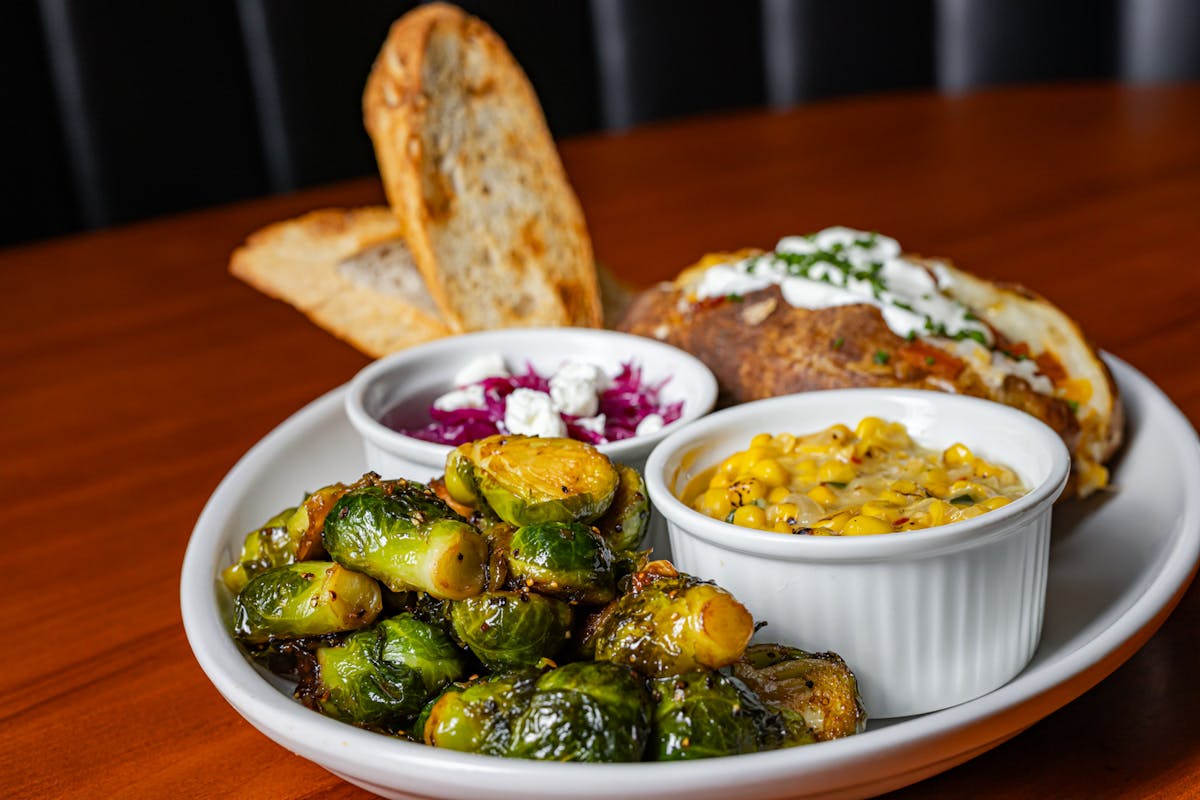 a plate of food on a wooden table