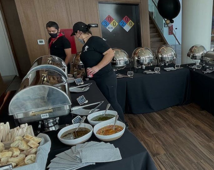 a person cooking food on a table