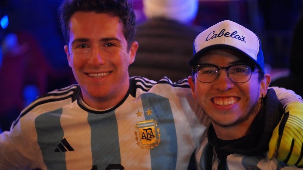 a couple of people posing for the camera