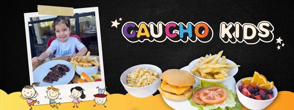 a person sitting at a table with a plate of food