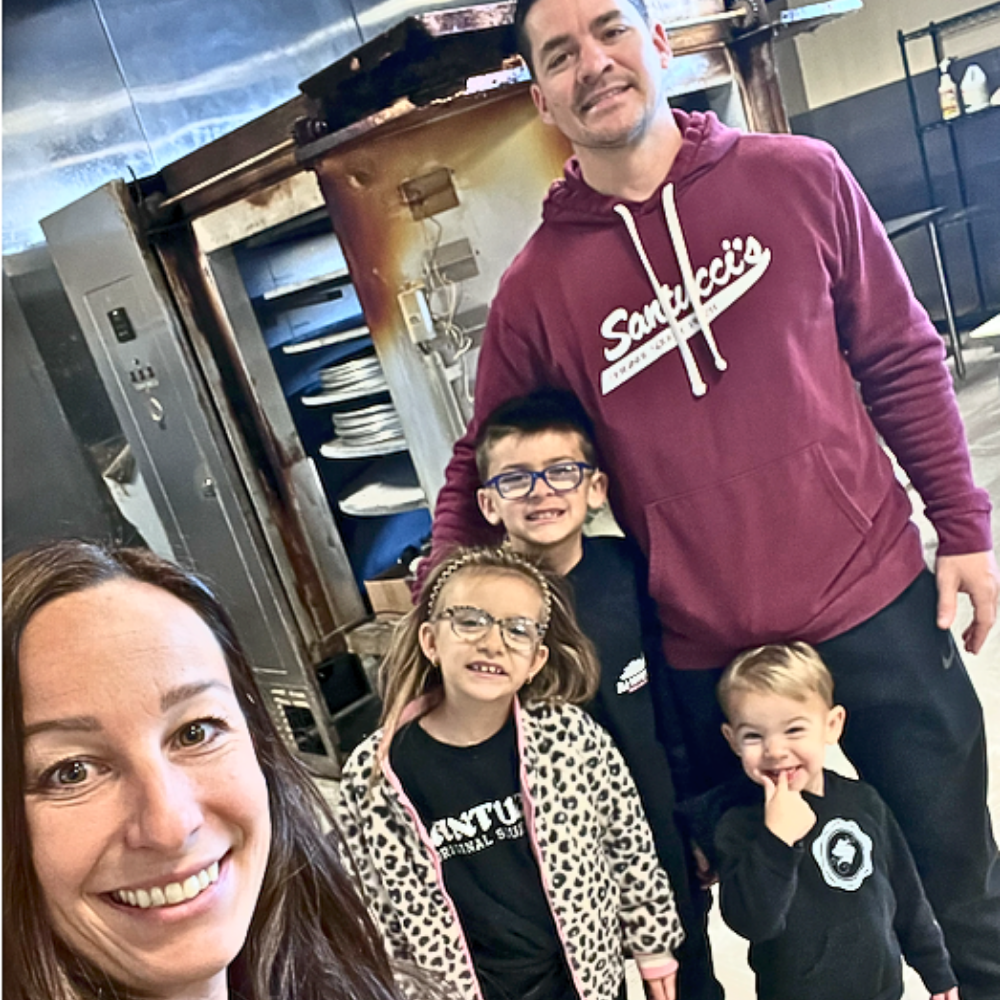 a group of people posing for the camera