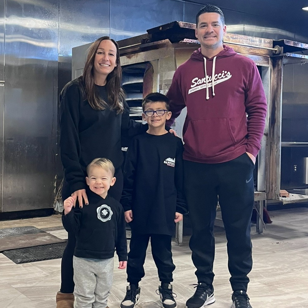 a group of people posing for the camera