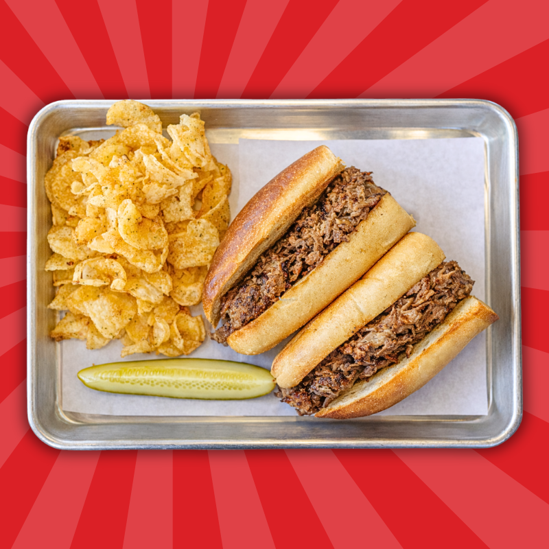 a hoagie on a serving platter