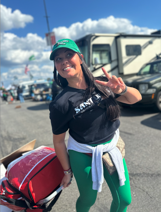 Alicia Santucci gives a peace sign at The Linc