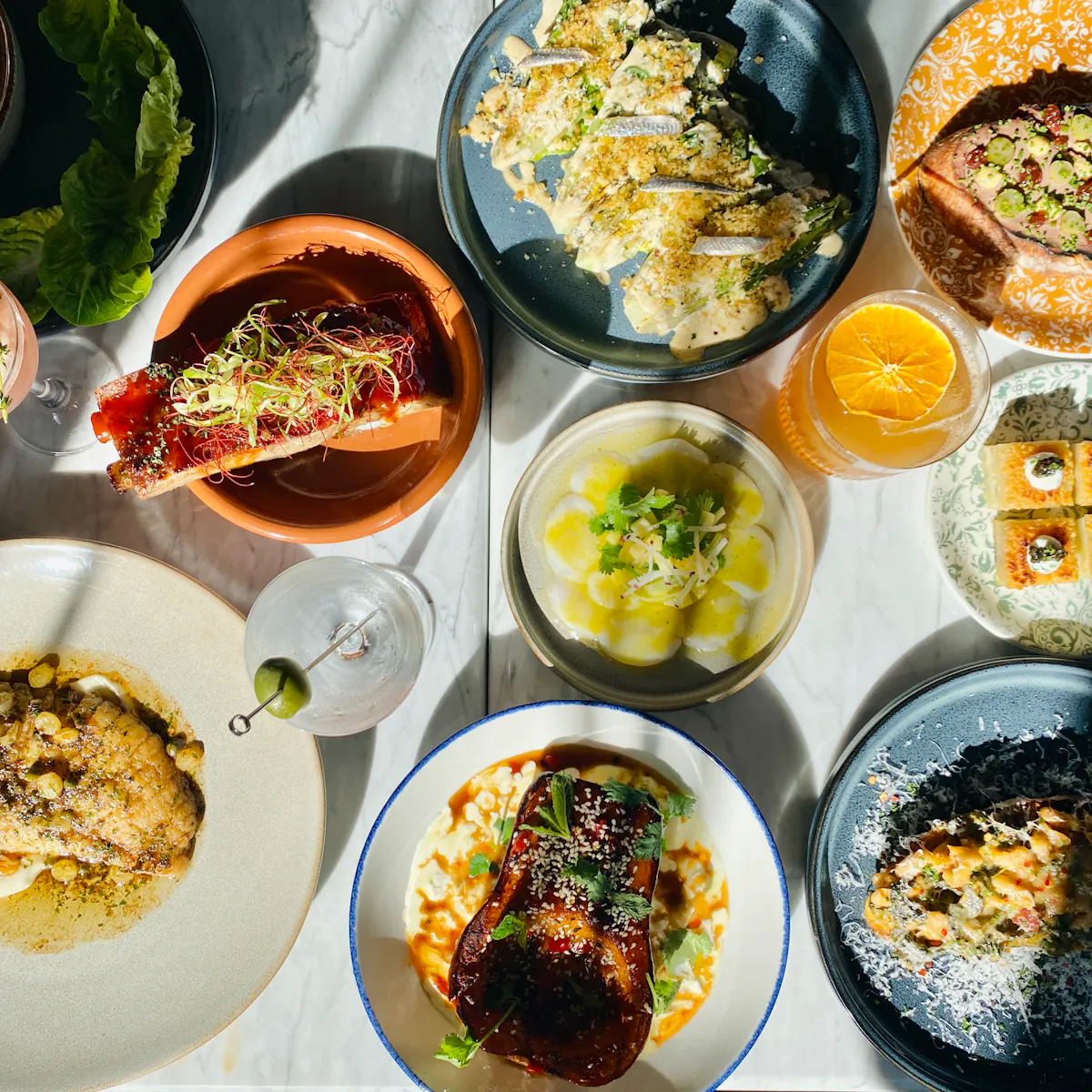 a bowl filled with different types of food on a table