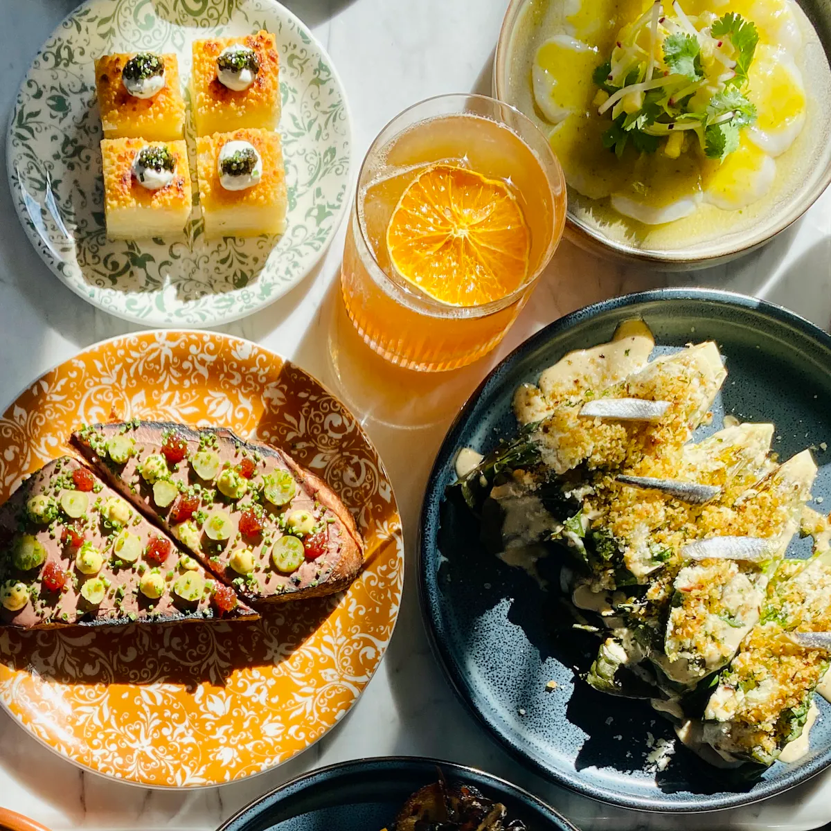 a bowl filled with different types of food on a plate