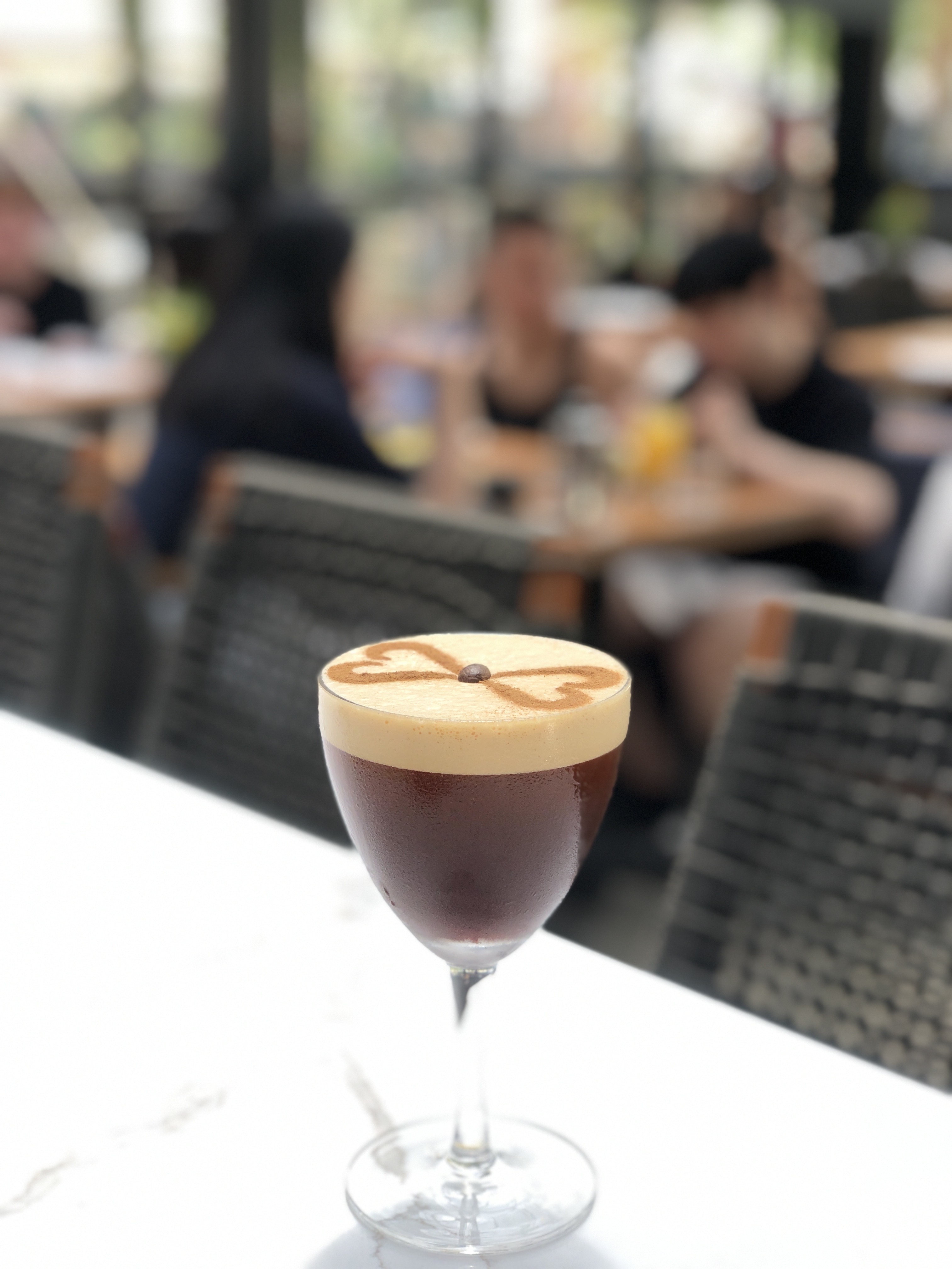 a cup of coffee and a glass of wine