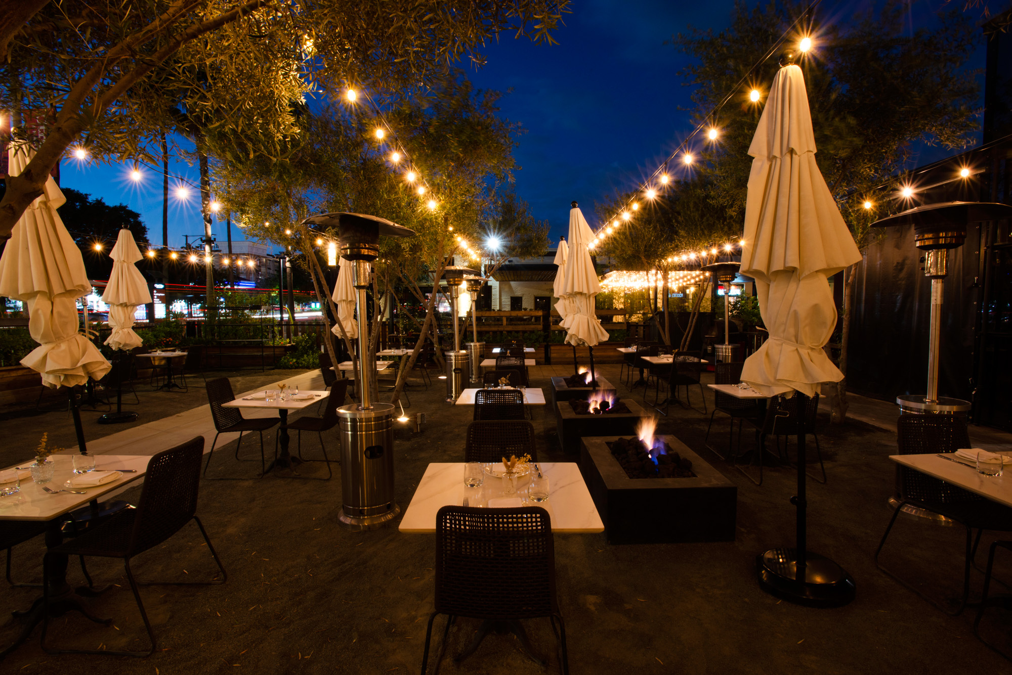 a group of people playing instruments and performing on a stage