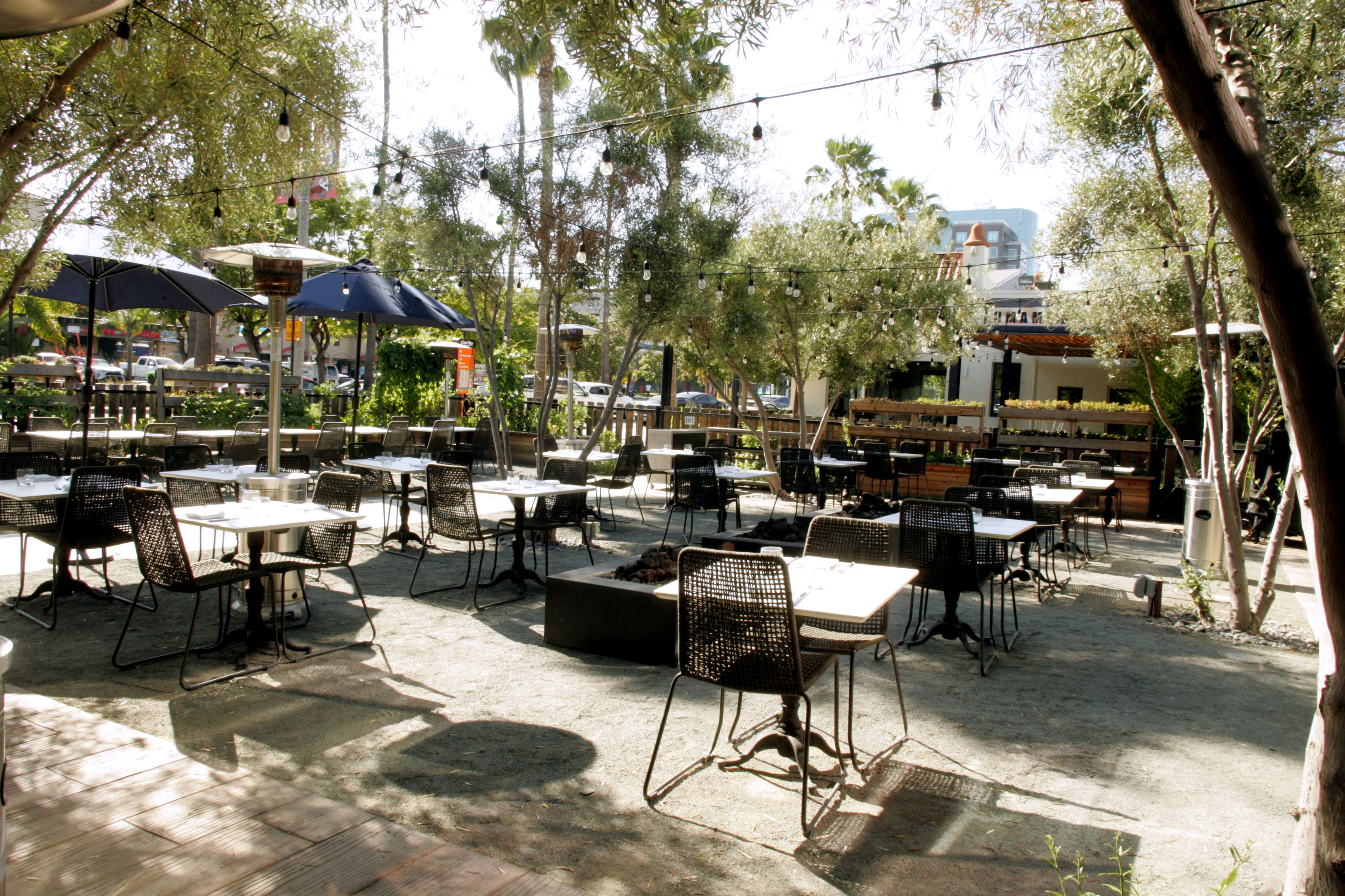 a group of lawn chairs sitting on top of a picnic table