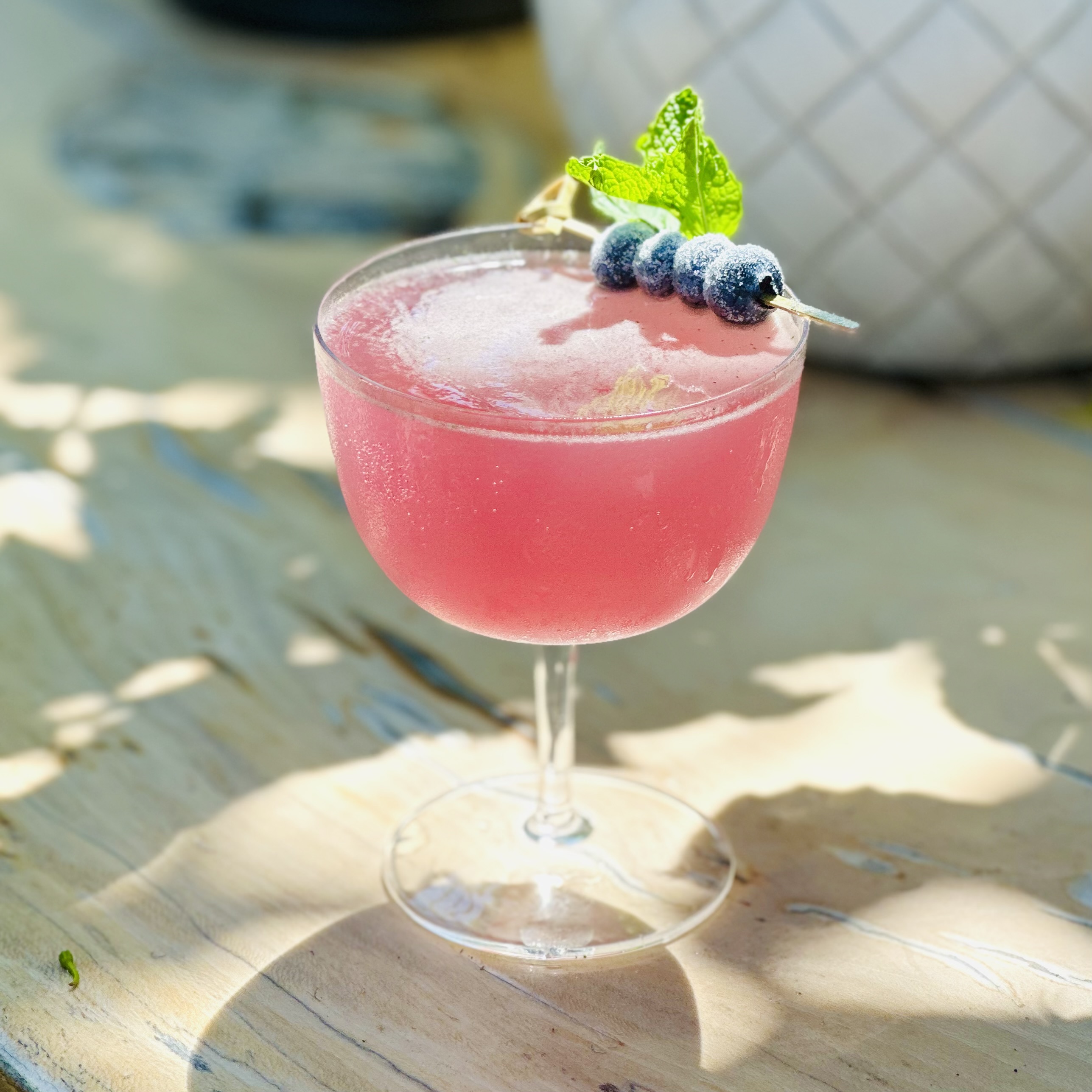 a close up of a glass cup on a table