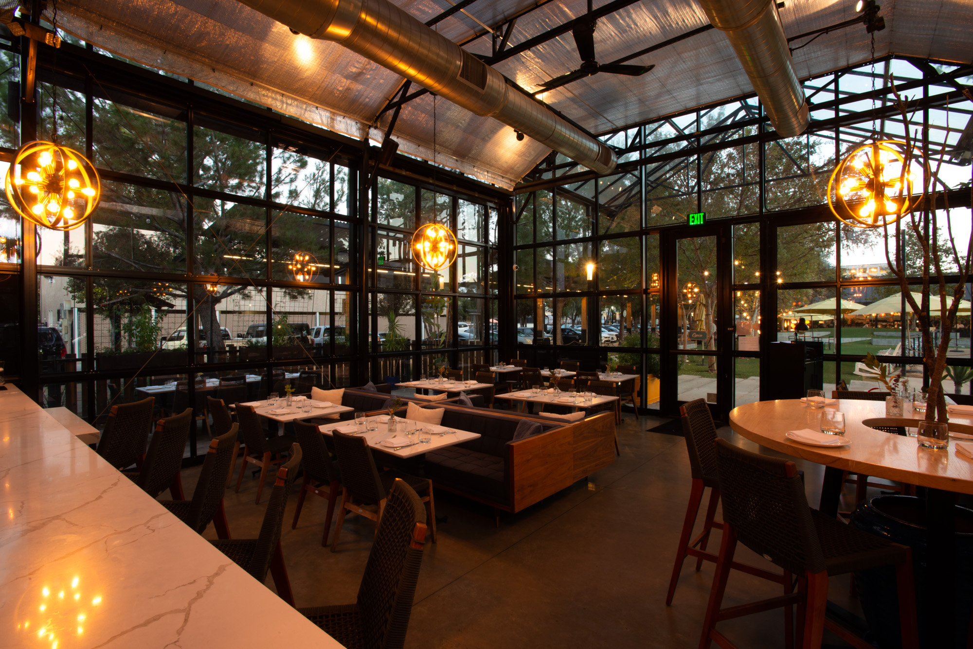 a dining room table in front of a building