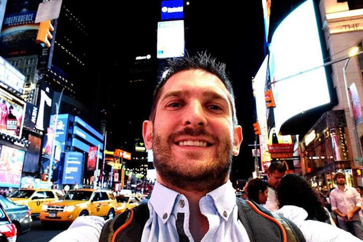 a man standing in front of a store