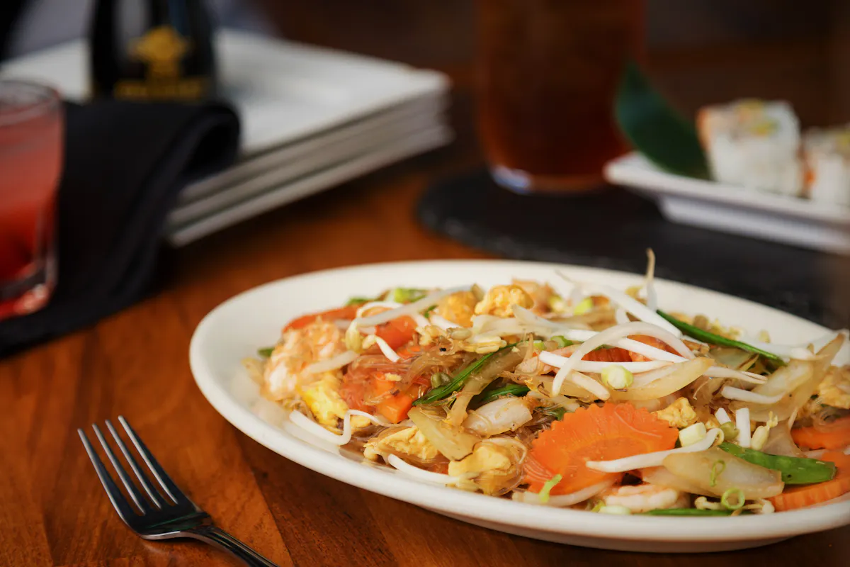 a closeup of a plate filled with sauteed vegetables