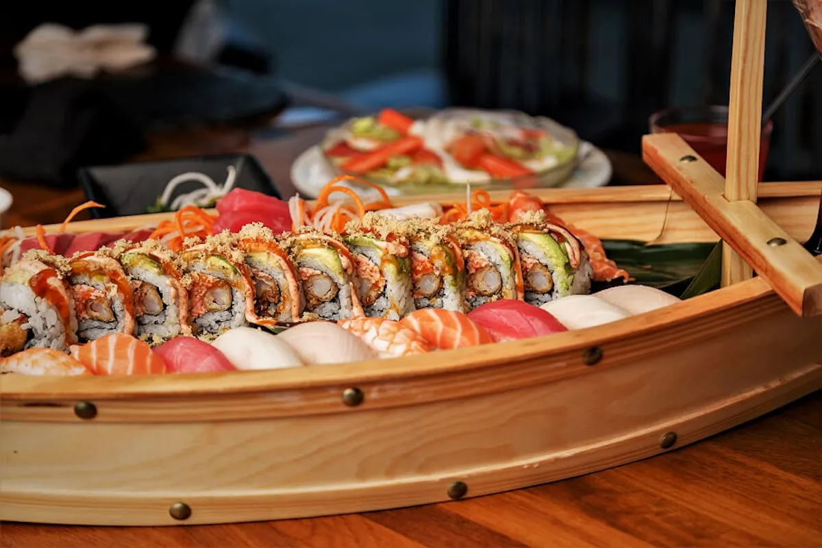 a tray of food on a wooden table