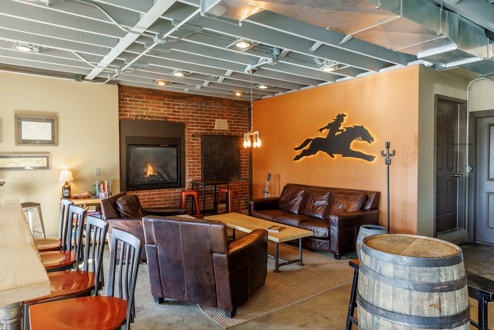 a room filled with furniture and a fire place