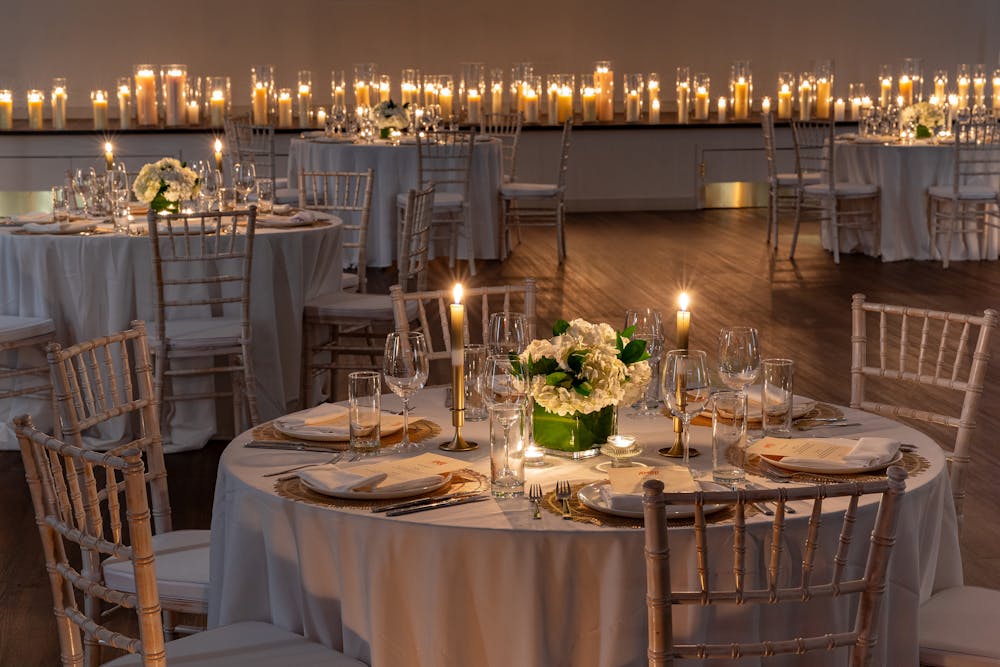a dining table filled with wine glasses