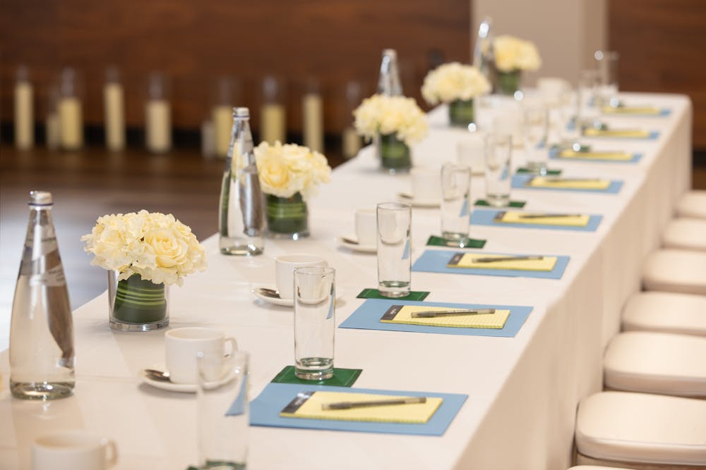 a dining table with wine glasses