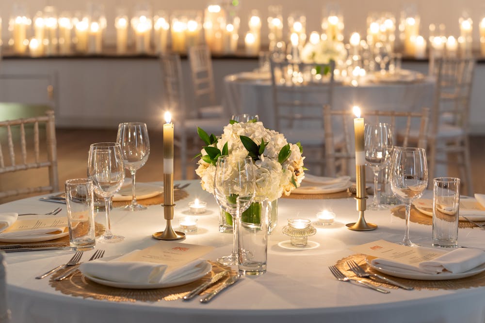 a dining table filled with wine glasses