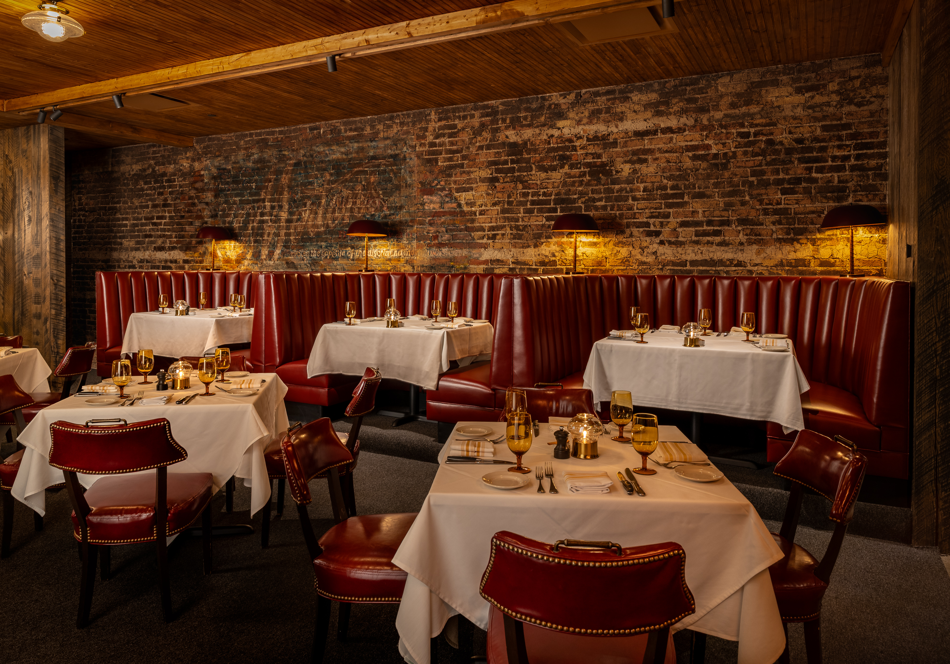 a restaurant with tables and chairs