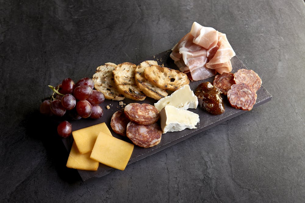 a box filled with different types of food on a table