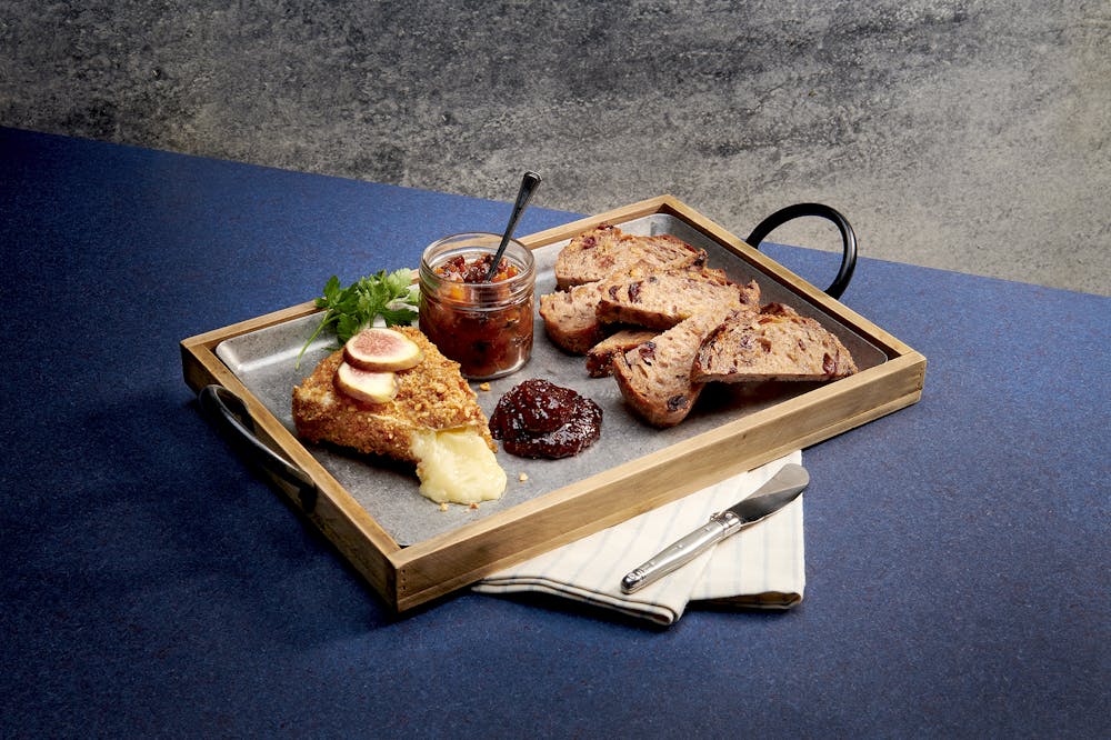 a piece of cake sitting on top of a wooden table