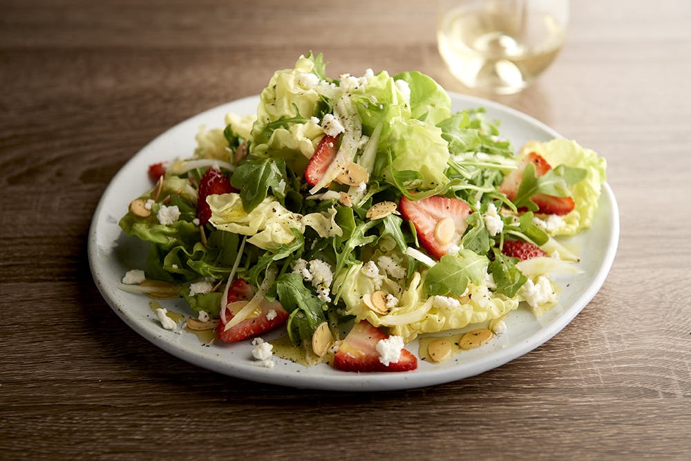 a plate of food and a cup of coffee