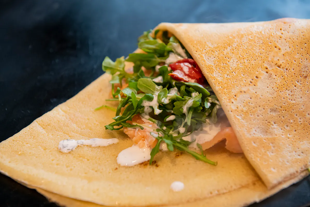 a close up of a sandwich on a cutting board