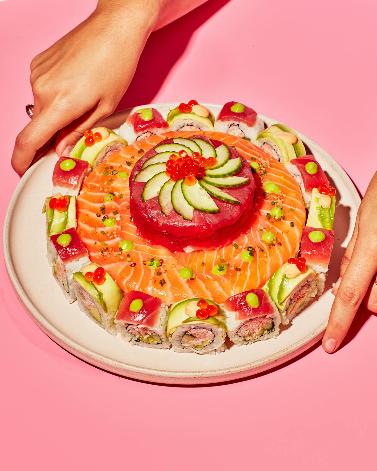 a person holding a plate of food