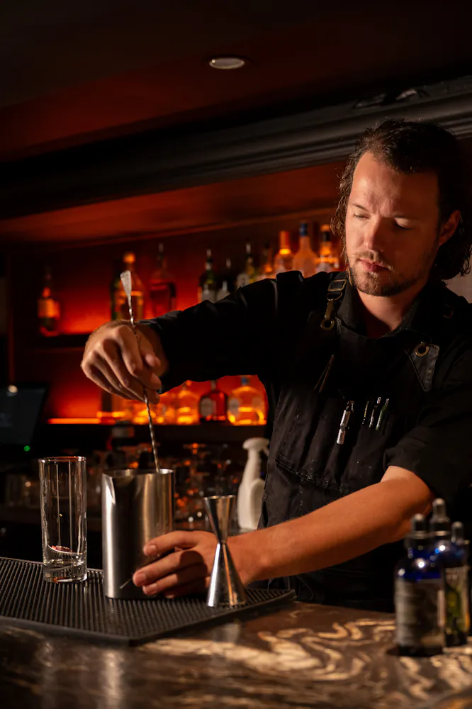 a man preparing food in a kitchen