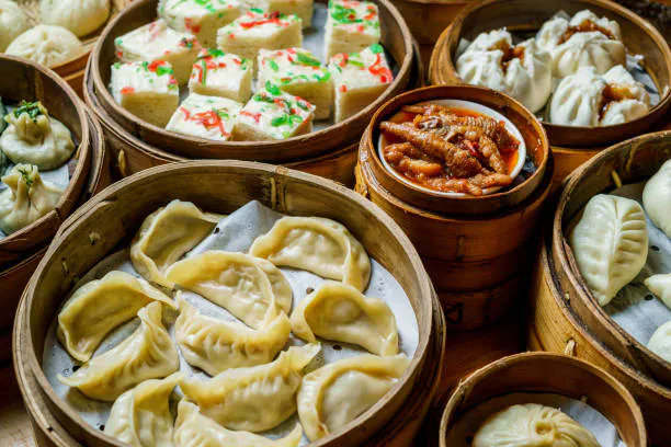 a group of dim sum containers