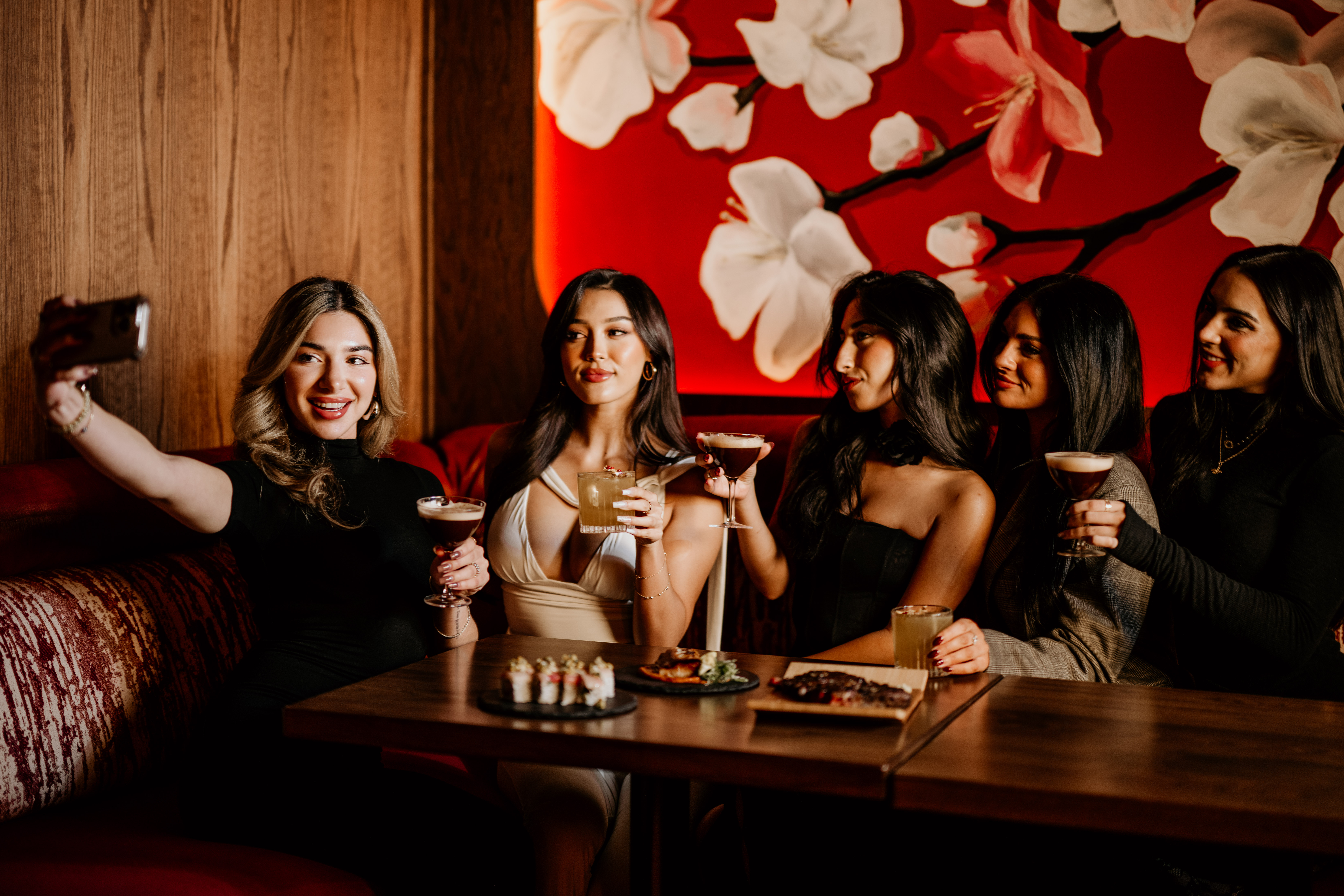 a group of people sitting at a table