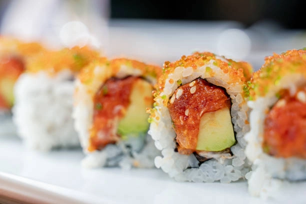 a close up of sushi rolls