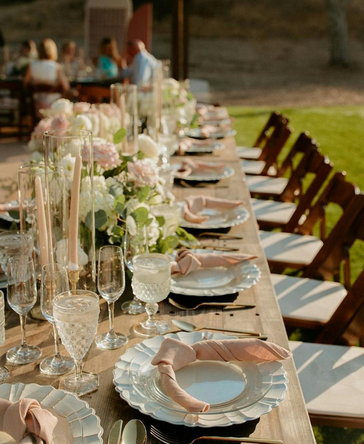 a dining table filled with wine glasses