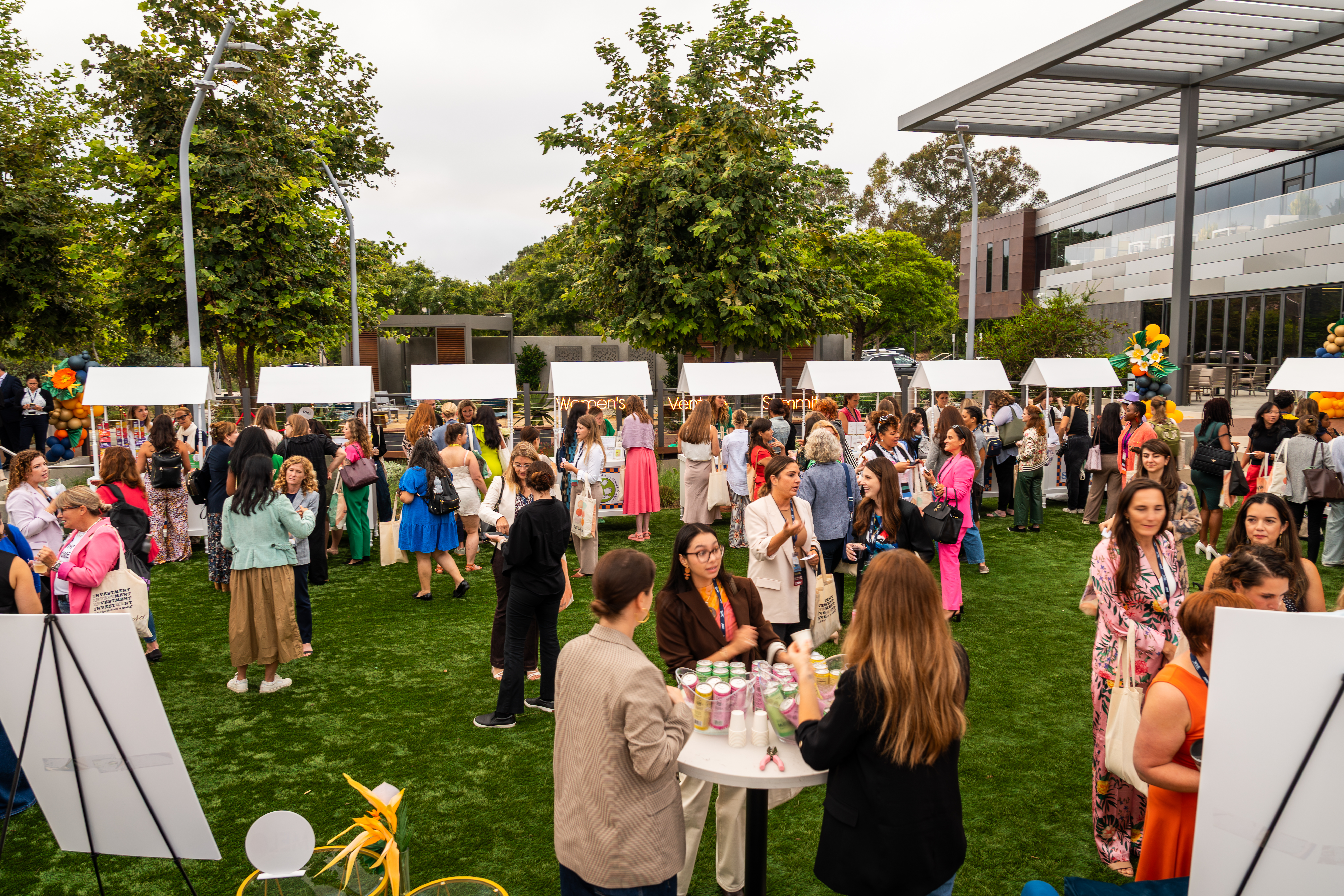 Guests gathering at an outdoor private event at Joya Kitchen in La Jolla.