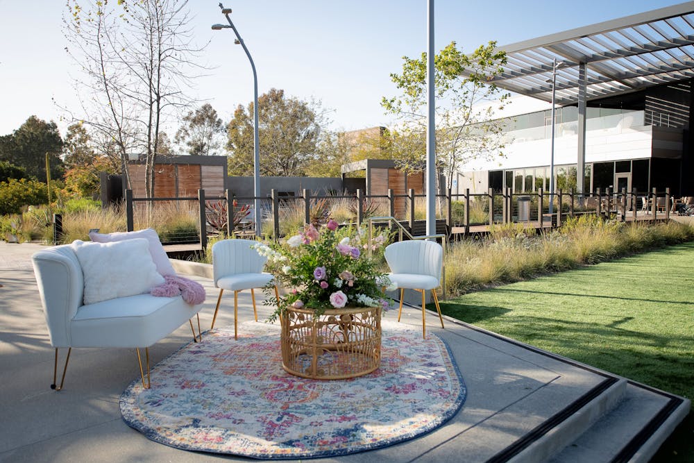 a chair sitting in front of a building