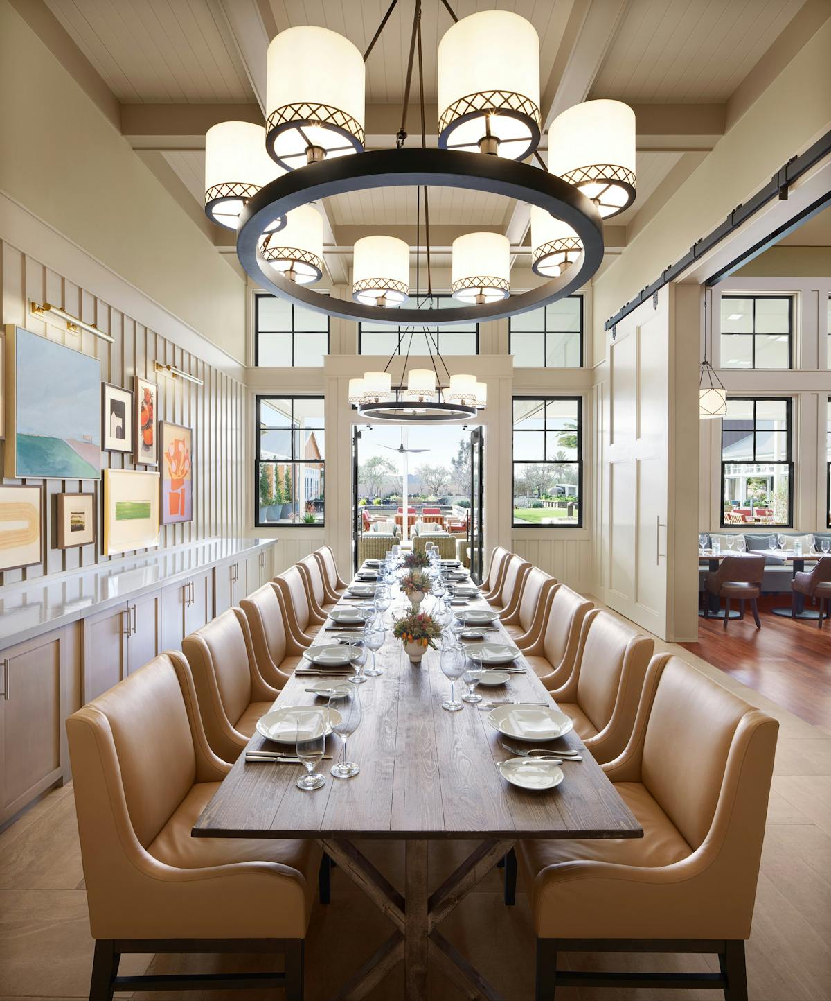 a dining room table in front of a window