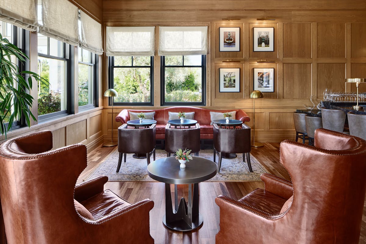 a room filled with furniture and a large window