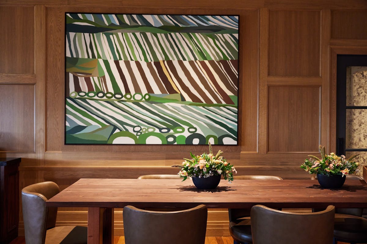 a vase of flowers on a table