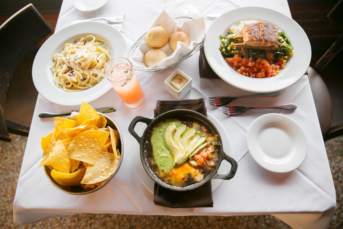 a bunch of food on a plate on a table